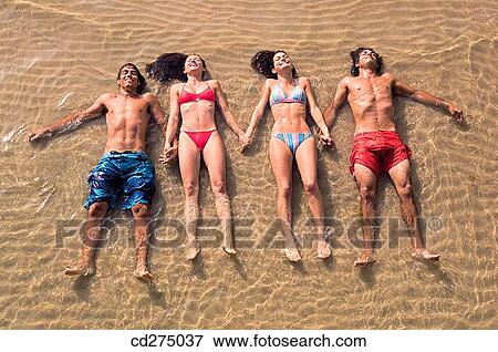 beach, calm, 20's View Large Photo Image Stock Photo - beach, calm, 20's. Fotosearch