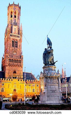 Belfry and Halles (covered market) with the monument to Jan Breydel and Pieter de Coninck at fore in the Markt (Market Square). Brugge. Flanders, Belgium View Large Photo Image Stock Photo - Belfry and Halles (covered market) with the monument to Jan Breydel and Pieter de Coninck at fore in the Markt (Market Square). Brugge. Flanders, Belgium. Fotosearch