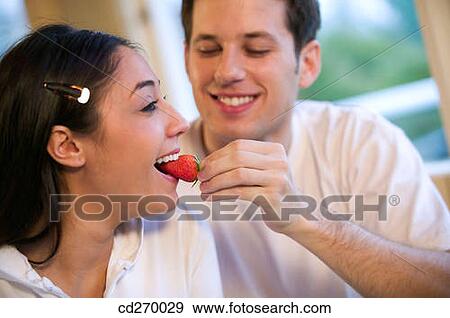 bite, biting, at-home View Large Photo Image Stock Photo - bite, biting, at-home. Fotosearch