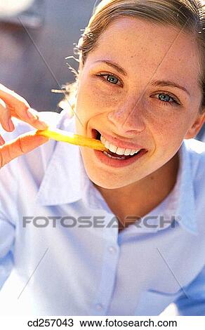bite, biting, blond, blue eyes View Large Photo Image Stock Image - bite, biting, blond, blue eyes. Fotosearch