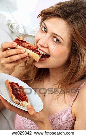 bite, biting, bread, Bread slice View Large Photo Image Stock Image - bite, biting, bread, Bread slice. Fotosearch