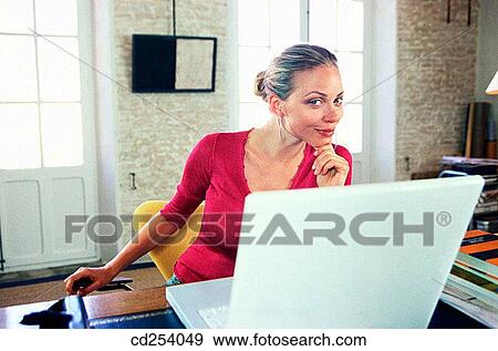 blond, computer, at-home View Large Photo Image Stock Photo - blond, computer, at-home. Fotosearch