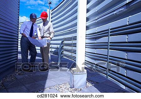 blueprint, colleague, cable, architect View Large Photo Image Picture - blueprint, colleague, cable, architect. Fotosearch