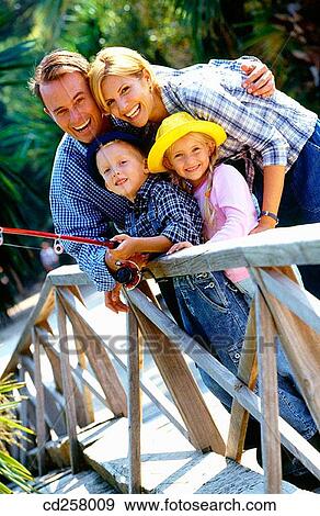 Stock Photo - boardwalk, boy, amusement. Fotosearch