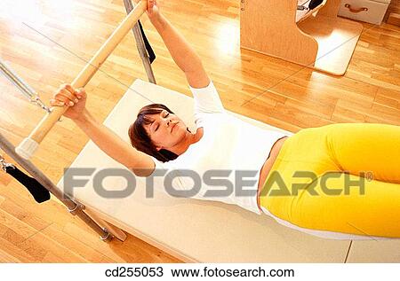 Stock Image - body, concentrate, Authentic Pilates. Fotosearch