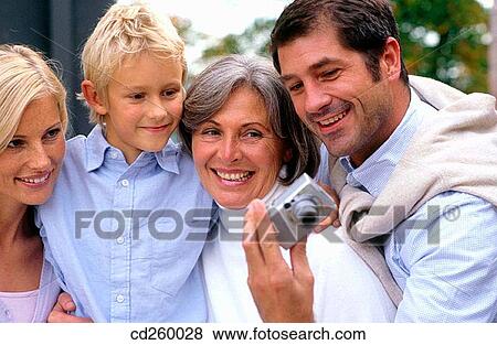Stock Photo - bond, boy, bonding, 30's. Fotosearch