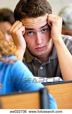 Stock Photograph - book, classroom, boy, adolescence. Fotosearch