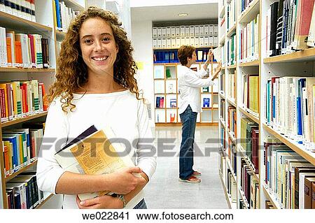 Stock Image - book, college, bookcase, adolescence. Fotosearch