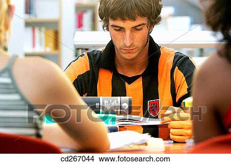book, college, boy, adolescence View Large Photo Image Picture - book, college, boy, adolescence. Fotosearch
