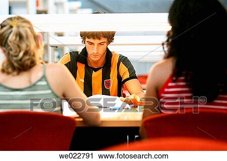 Stock Image - book, college, boy, adolescence. Fotosearch