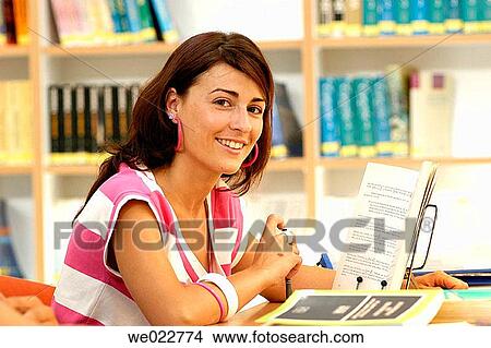 book, college, brunette, adolescence View Large Photo Image Picture - book, college, brunette, adolescence. Fotosearch