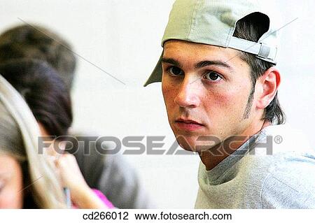 boy, classroom, cap, adolescence View Large Photo Image Stock Image - boy, classroom, cap, adolescence. Fotosearch