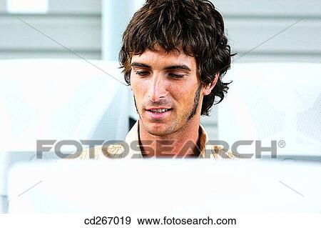 Stock Photo - boy, college, classroom, adolescence. Fotosearch