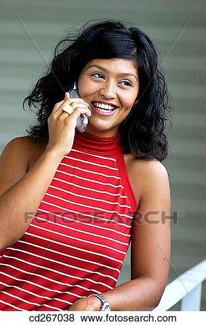 brunette, cell phone, calling, adolescence View Large Photo Image Stock Photo - brunette, cell phone, calling, adolescence. Fotosearch