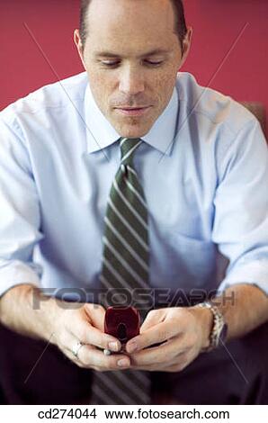 business, businessman, businesspeople, cell phone View Large Photo Image Picture - business, businessman, businesspeople, cell phone. Fotosearch
