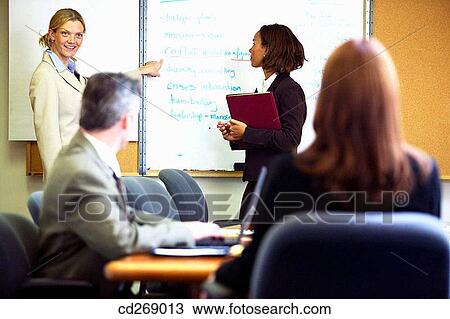 business, businessman, businesspeople, businesswoman, collaboration View Large Photo Image Stock Image - business, businessman, businesspeople, businesswoman, collaboration. Fotosearch