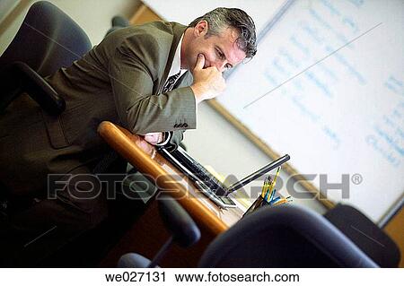 Stock Image - business, businessman, businesspeople, computer, contemporary. Fotosearch