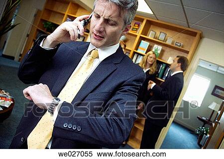 business, businessman, businesspeople, calling, cell phone, clock View Large Photo Image Stock Photography - business, businessman, businesspeople, calling, cell phone, clock. Fotosearch