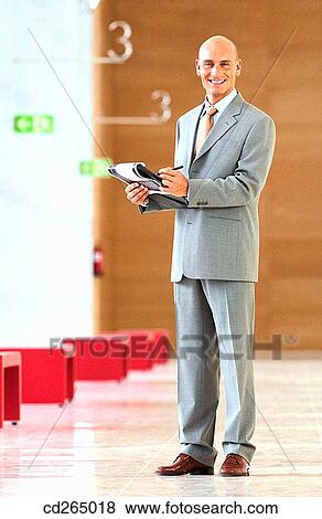 Stock Photo - business, businesspeople, businessman, 30's. Fotosearch