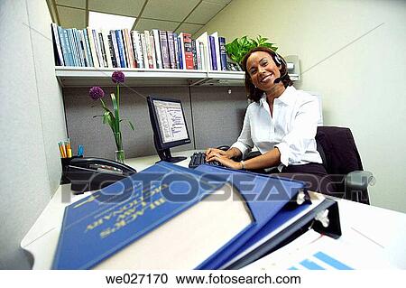 Stock Image - business, businesspeople, businesswoman, contemporary, cubicle. Fotosearch