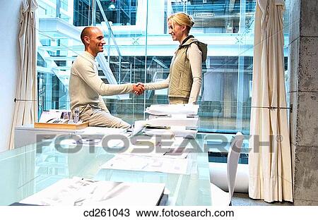 Stock Image - business, businesswoman, businesspeople, businessman, agreement. Fotosearch