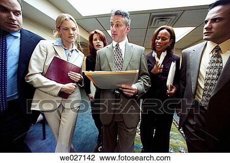 Stock Image - business, businesswoman, businesspeople, businessman, activity. Fotosearch