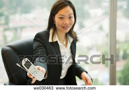 business, cell phone, businesswoman, businesspeople, Asian View Large Photo Image Stock Image - business, cell phone, businesswoman, businesspeople, Asian. Fotosearch