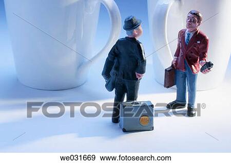 Stock Photo - Businessman Figures and Coffee Cups. Fotosearch