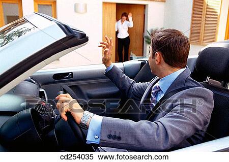 Businessman leaving home for work View Large Photo Image Stock Photography - Businessman leaving home for work. Fotosearch