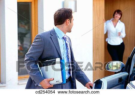 Businessman leaving home to work View Large Photo Image Picture - Businessman leaving home to work. Fotosearch