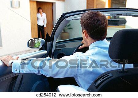 Businessman leaving home to work View Large Photo Image Stock Image - Businessman leaving home to work. Fotosearch