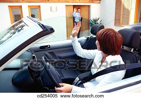 Businesswomen leaving home for work View Large Photo Image Stock Photography - Businesswomen leaving home for work. Fotosearch