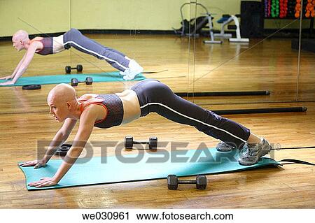 Caucasian woman with cancer/alopecia areata working out View Large Photo Image Stock Image - Caucasian woman with cancer/alopecia areata working out. Fotosearch