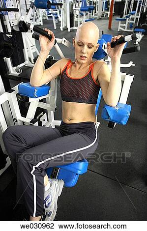 Caucasian woman with cancer/alopecia areata working out View Large Photo Image Stock Image - Caucasian woman with cancer/alopecia areata working out. Fotosearch