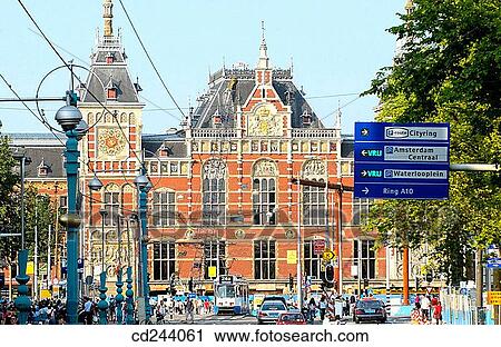 Central Station, Damrak. Amsterdam. Netherlands View Large Photo Image Stock Image - Central Station, Damrak. Amsterdam. Netherlands. Fotosearch