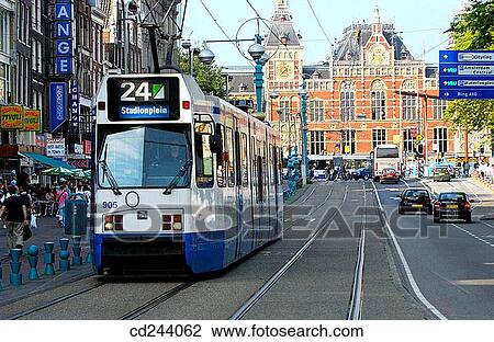 Central Station, Damrak. Amsterdam. Netherlands View Large Photo Image Stock Image - Central Station, Damrak. Amsterdam. Netherlands. Fotosearch