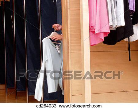 changing-room, Clothing store, choosing, choice, anonymous View Large Photo Image Stock Image - changing-room, Clothing store, choosing, choice, anonymous. Fotosearch