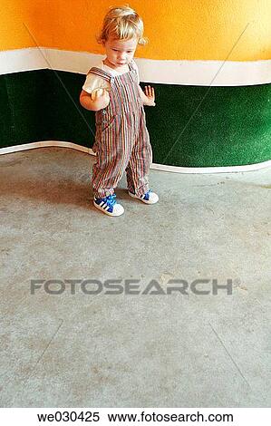 Child Standing Alone View Large Photo Image Stock Photography - Child Standing Alone. Fotosearch