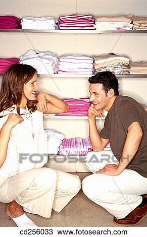 Stock Image - choice, Clothing store, choosing, 20's. Fotosearch