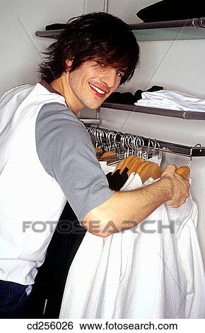Stock Photograph - Clothing store, contemporary, Facial expression. Fotosearch