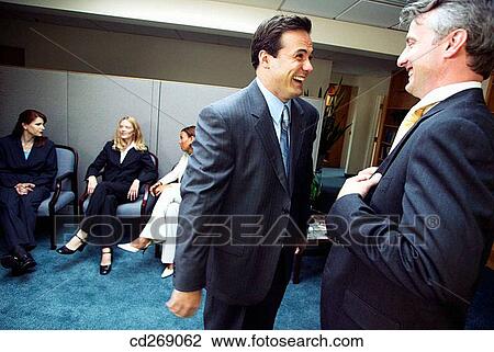 Stock Image - colleague, business, chat, businesspeople, businessman, amusement. Fotosearch