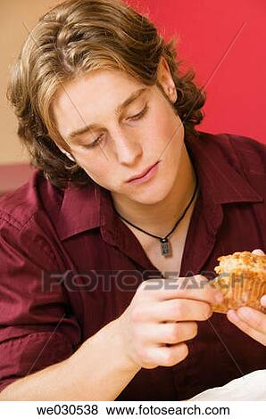 Facial expression, food, holding View Large Photo Image Stock Photo - Facial expression, food, holding. Fotosearch