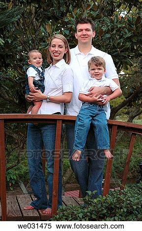 Stock Photography - Family of Four Portrait. Fotosearch