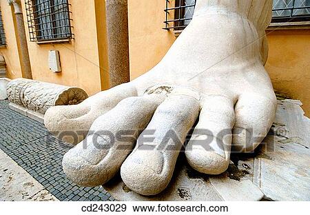 Foot of statue of Emperor Constantine II at courtyard of Palazzo dei Conservatori, Capitoline Museum. Rome. Italy View Large Photo Image Stock Photo - Foot of statue of Emperor Constantine II at courtyard of Palazzo dei Conservatori, Capitoline Museum. Rome. Italy. Fotosearch