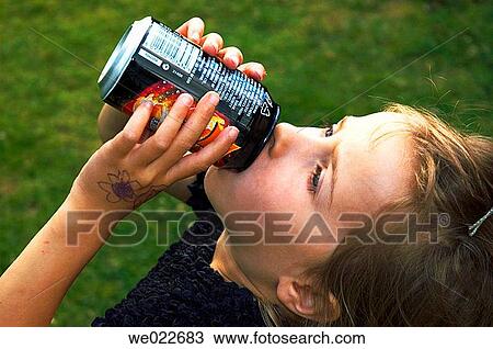 Girl drinking can of pop View Large Photo Image Stock Image - Girl drinking can of pop. Fotosearch