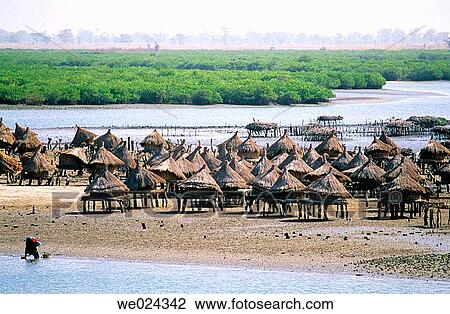 Grain stores on stilts, Catholic village of Joal-Fadiuth where last president L? opold Senghor was born. Senegal View Large Photo Image Stock Image - Grain stores on stilts, Catholic village of Joal-Fadiuth where last president L? opold Senghor was born. Senegal. Fotosearch