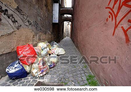Heap of sacks with recycable waste in medieval street, Ratisbone / Regensburg, Upper Palatinate, Bavaria, Germany View Large Photo Image Stock Photo - Heap of sacks with recycable waste in medieval street, Ratisbone / Regensburg, Upper Palatinate, Bavaria, Germany. Fotosearch