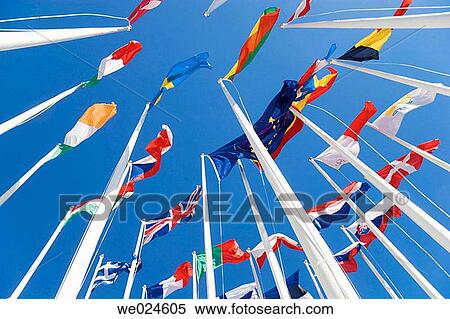 International flags on flagpoles View Large Photo Image Stock Photography - International flags on flagpoles. Fotosearch