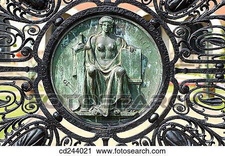 Justice symbol on iron gate, Vredespaleis (? Peace Palace? 1909-1913) houses United Nations? International Court of Justice. The Hague. Netherlands View Large Photo Image Stock Image - Justice symbol on iron gate, Vredespaleis (? Peace Palace? 1909-1913) houses United Nations? International Court of Justice. The Hague. Netherlands. Fotosearch