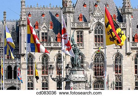 Landhuis, Provincial Government palace and monument to Jan Breydel and Pieter de Coninck in the Markt (Market Square). Brugge. Flanders, Belgium View Large Photo Image Stock Photograph - Landhuis, Provincial Government palace and monument to Jan Breydel and Pieter de Coninck in the Markt (Market Square). Brugge. Flanders, Belgium. Fotosearch